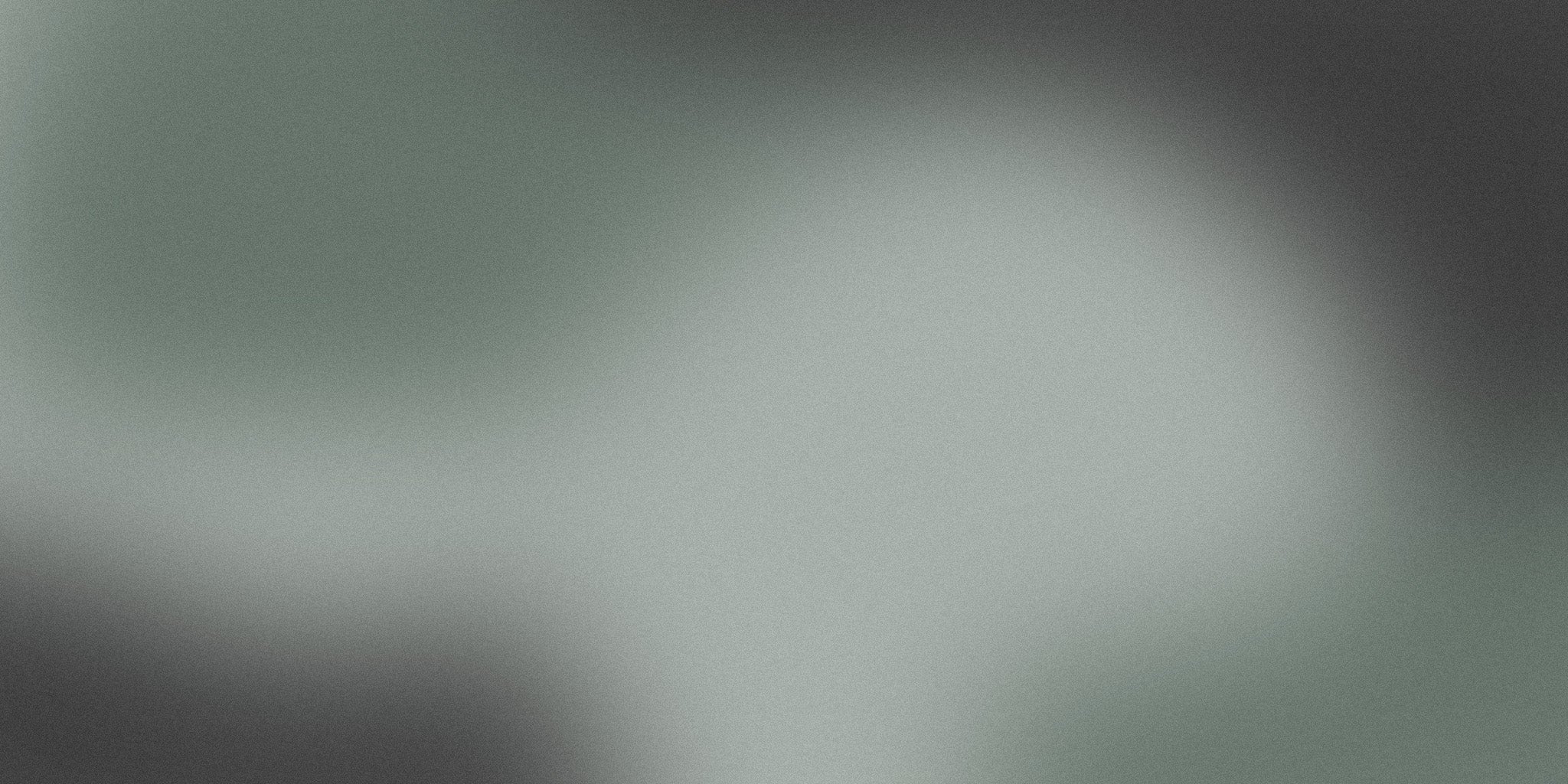 Soft green and gray gradient abstract background with smooth transitions