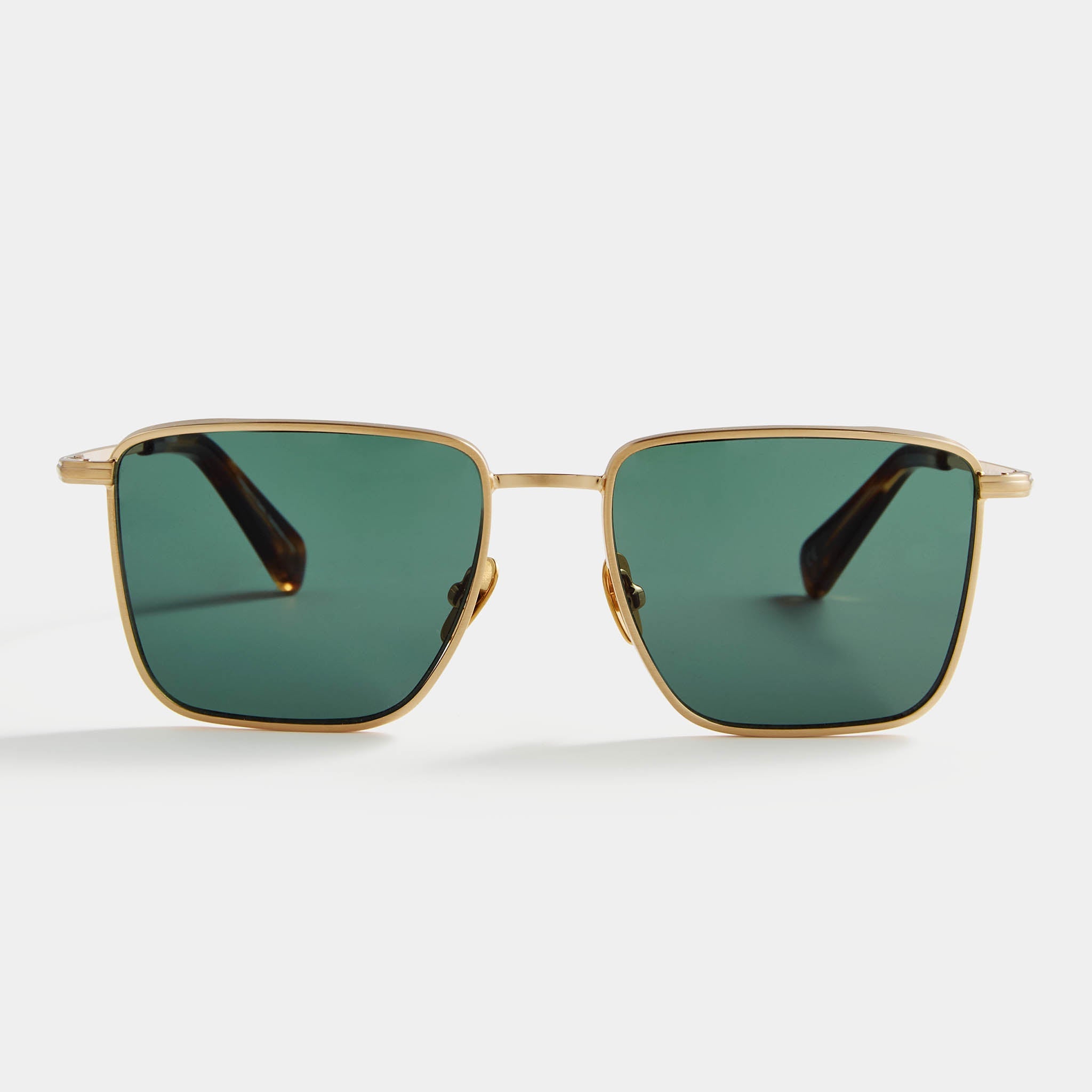 Gold square sunglasses with green lenses on white background
