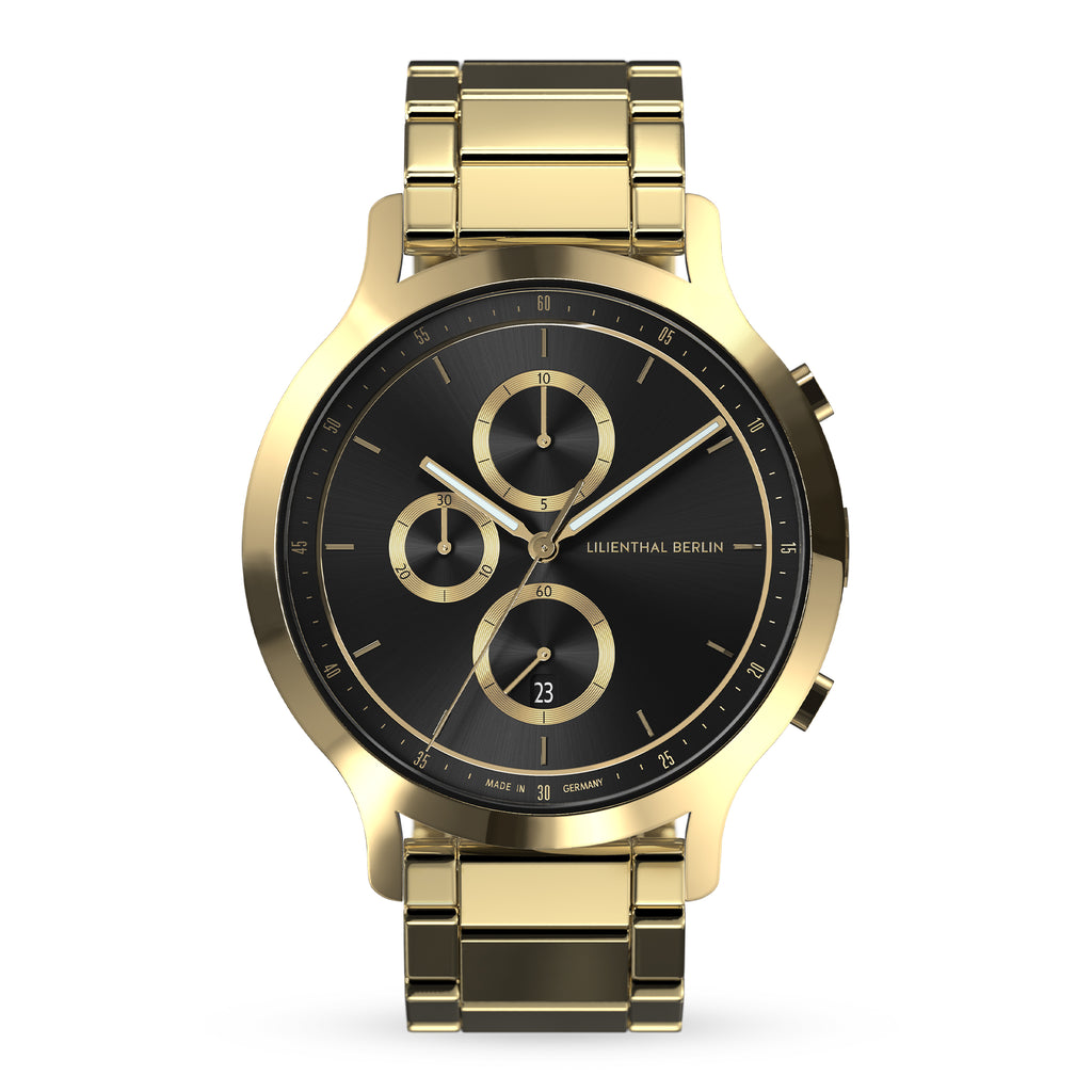 Gold stainless steel chronograph watch with black dial and date display